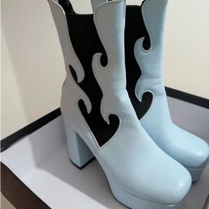 Elegant Light Blue and Black Heeled Boots